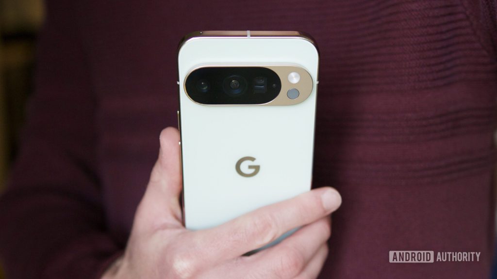 Someone holding the Pixel 10 Pro, showing the back of the phone.