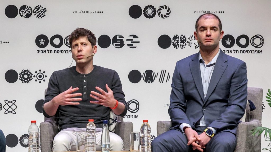 Former OpenAI Exec Explains Why He Tried to Do a Coup Against Sam Altman Sam Altman (left) and Ilya Sutskever (Right) sit in chairs on stage at an event.