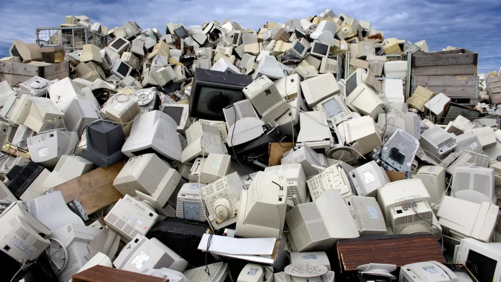 How Do I Recycle My Old Computers, Printers and Other Electronics for Free? A pile of computers and monitors