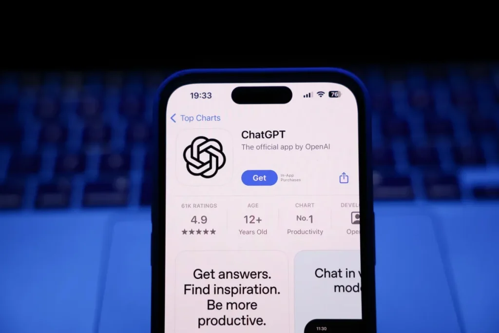 Seven more families are now suing OpenAI over ChatGPT’s role in suicides, delusions A laptop keyboard and ChatGPT on App Store displayed on a phone screen.
