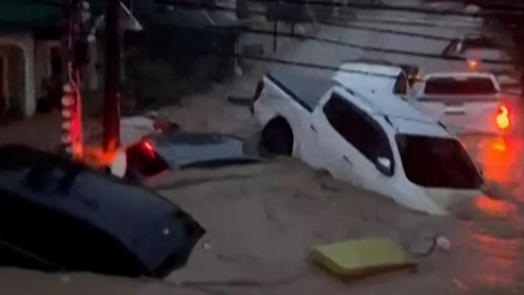 Video: Typhoon floods wash away cars and shipping containers in Philippines | Floods