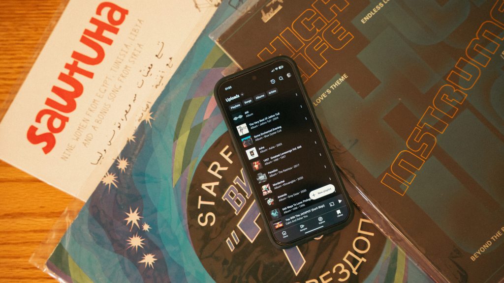 YouTube Music uploaded music on a stack of records